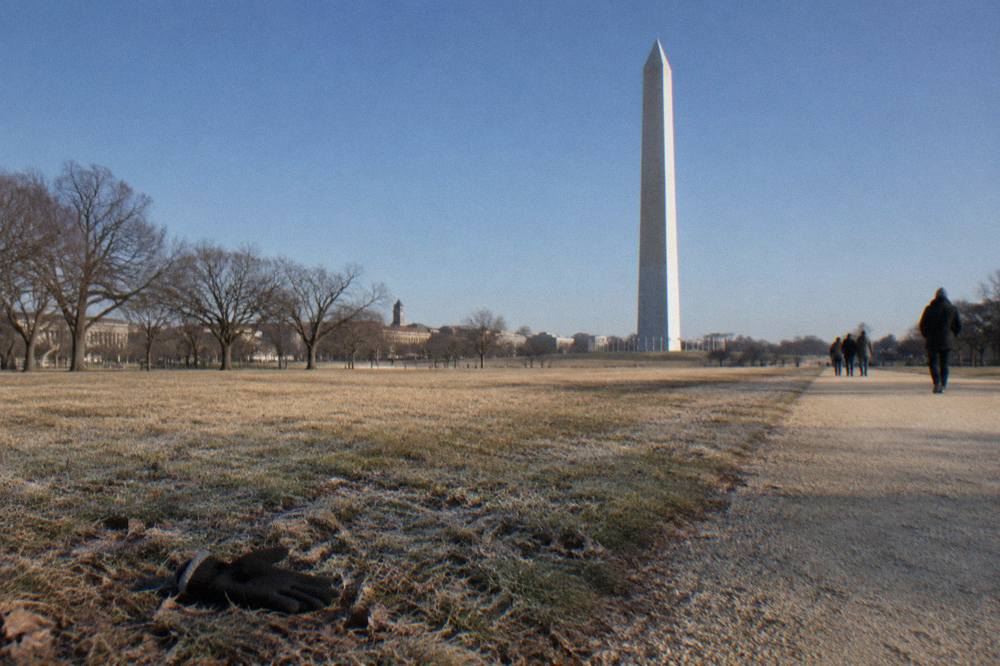 The Washington Monument seen from the National Mall lawn with the sky above