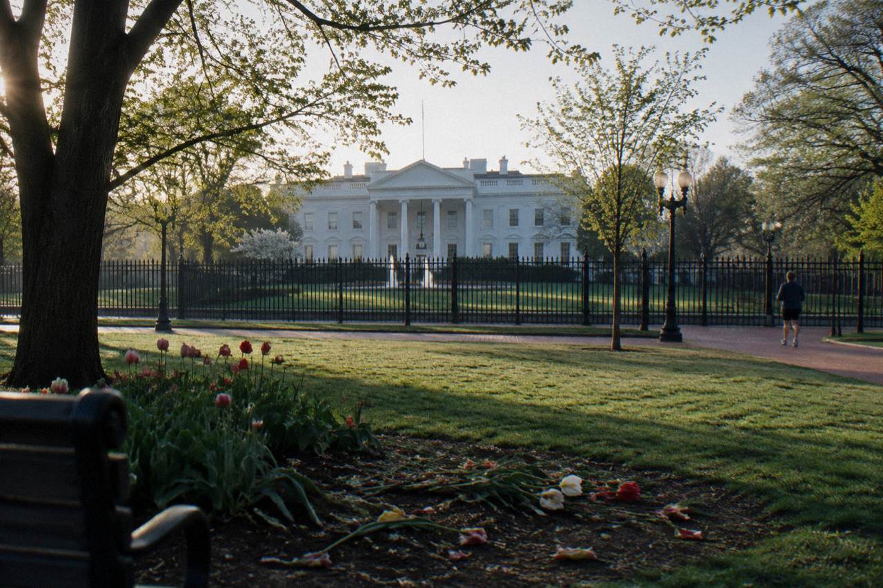 The north face of the White House seen across green lawn from Lafayette Square