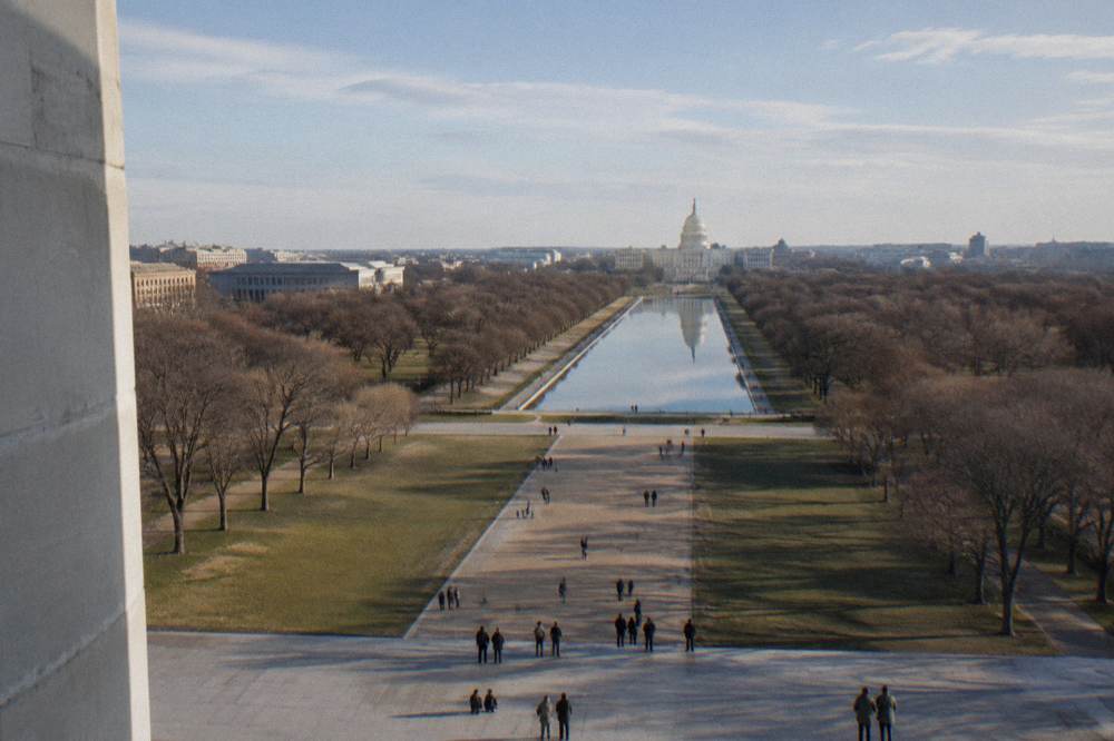 View from the Washington Monument observation level across the National Mall and reflecting pool