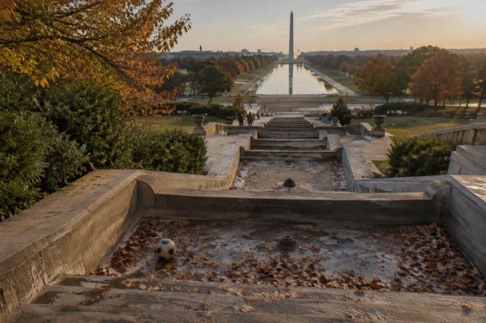 Stone cascade fountain and terraces of Meridian Hill Park in autumn light