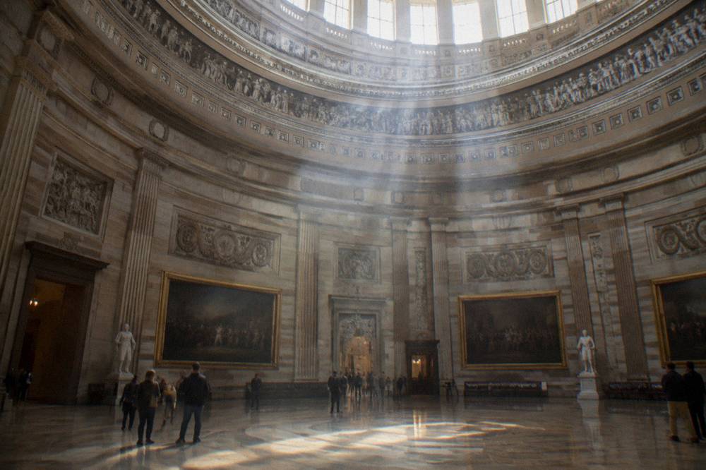 Interior of the Capitol Rotunda with its canopy fresco and statuary