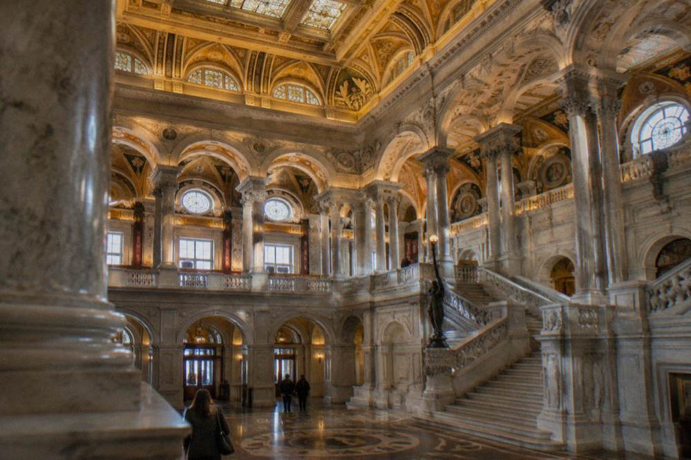 Great Hall of the Library of Congress Jefferson Building with its gilded arches and stained-glass ceiling