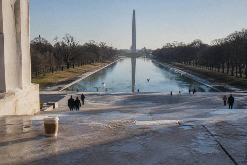 Stone steps of the Lincoln Memorial facing the Reflecting Pool toward the Washington Monument
