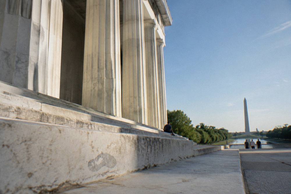 Stone steps of the Lincoln Memorial with columns and open sky above